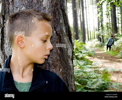 Young Boy Hiding Stock Photo Alamy