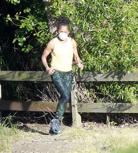 From witnesses, the tax service. Doria Ragland in a Yellow Tank Top Enjoys a Jog with a ...