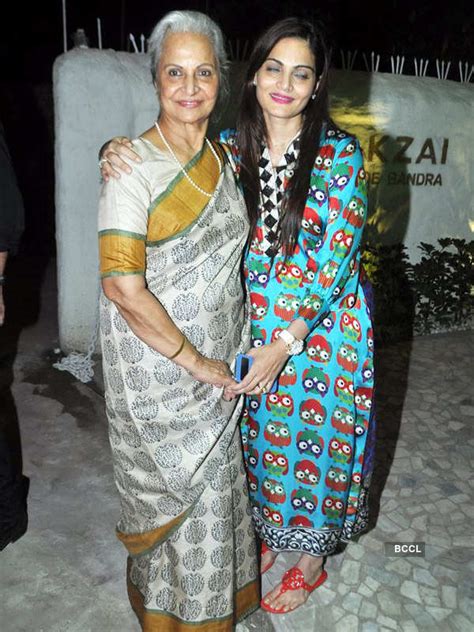 Sangeeta Bijlani Flaunts Her Perfect Curves In Black Sari At The Launch