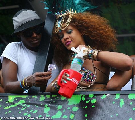 Rihanna Shows Off Her Curvy Figure As She Parties At Barbados Carnival
