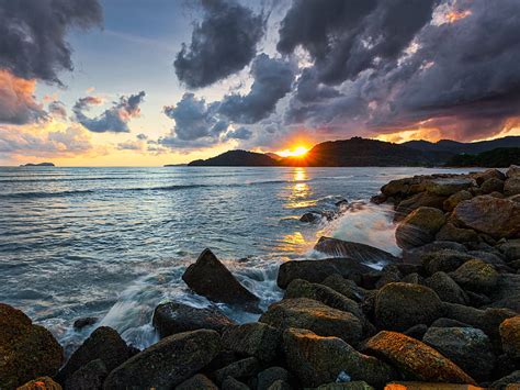 Sunset Rays Coast Sea Stones Hd Wallpaper Peakpx