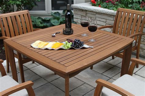 Use it for your guest to dine on or as a serving table, the possibilities are endless. Eucalyptus Wood Square Dining Table with Umbrella Hole