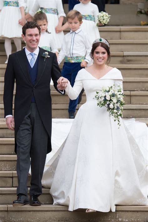 The dress features a neckline that folds around the shoulders to a low back that drapes into a flowing full length train. 12 Hidden Details You Missed On Princess Eugenie's Wedding ...