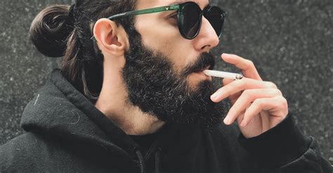 Portrait Of A Man Smoking A Cigarette · Free Stock Photo