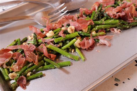 Place the white parts, asparagus, and onion wedges in an even layer in a shallow large roasting pan. Sheet Pan Roasted Asparagus with Prosciutto & Hazelnuts ...