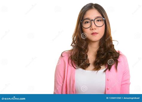 Portrait Of Young Beautiful Asian Woman Wearing Eyeglasses Stock Photo