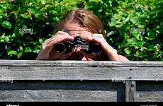 spying binoculars neighbours