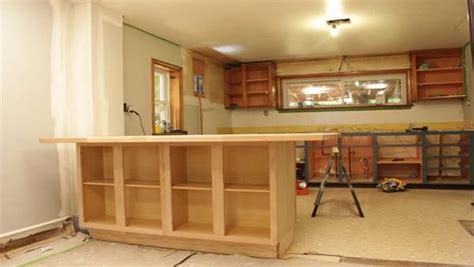 Step 1 build a 100 cm x 60 cm wooden frame and fasten it to the floor. How to Make a Kitchen Island Out of Cabinets | Building a ...