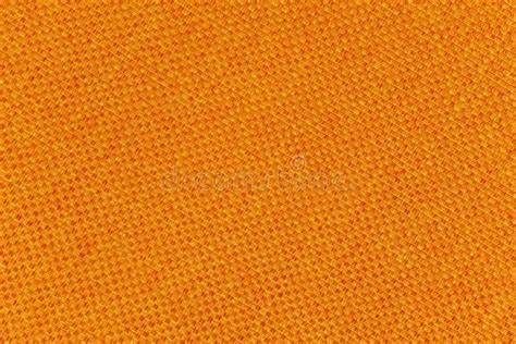 Background Made Of A Closeup Of An Orange Fabric Texture Stock Photo