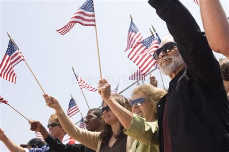 People Holding American Flag During A Rally Stock Image Image Of