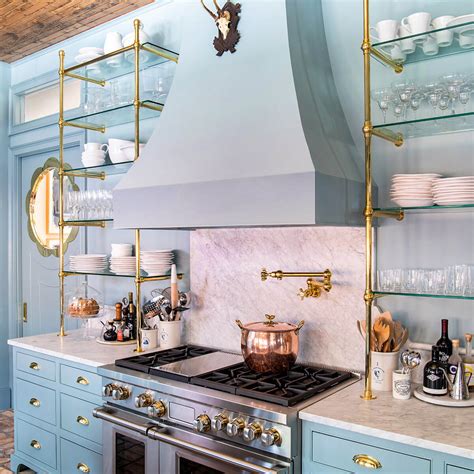 Ball Style Tubular Brass Shelving With Glass Shelves In Kitchen
