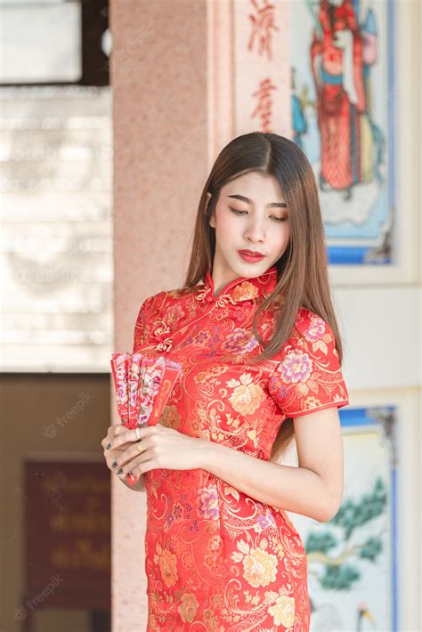 premium photo beautiful woman asian wearing red dress in chinese new year