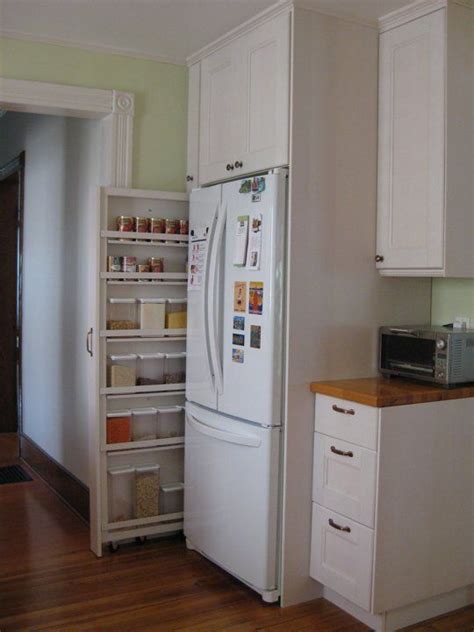 Find slide out pantry beside refrigerator now. Kitchen Before & After: A Brighter Yet Still Homey Kitchen ...