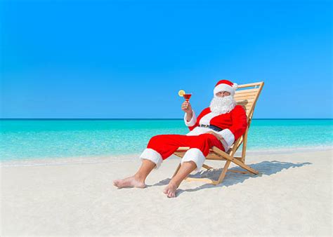 Santa Beach Stock Photos Pictures And Royalty Free Images Istock