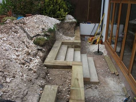 An ideal material for building raised beds, garden sleepers are a popular choice thanks to their rustic look and rugged reliability. Steps, walls & Patio with new railway sleepers | Concrete ...