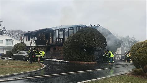 2 officers hurt rescuing dog from burning home in East Northport, Long