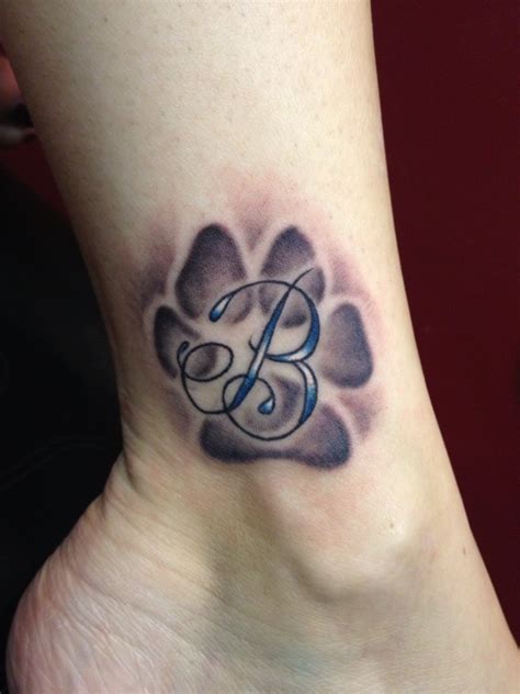74 footprint tattoos for moms. Sweet Paw Print Tattoos On Left Hip For Girls » Tattoo Ideas