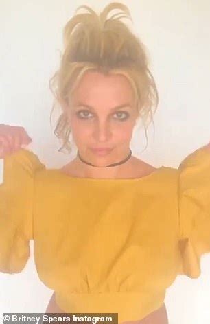Britney Spears Dons Yellow And Insists She Was JOKING When Claiming To Beat Usain Bolt S