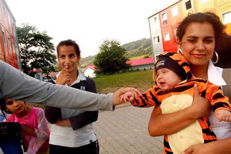 The total land area is 77,240. Common Ground: Czech Roma