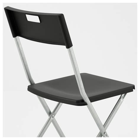 Dining chairs don't just have to look good, but should feel good, too. GUNDE - folding chair, black | IKEA Hong Kong