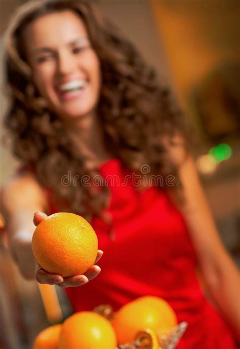 Closeup On Young Housewife Giving Orange Stock Image Image Of Orange