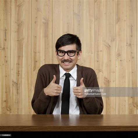 Portrait Of Businessman Giving Thumbs Up High Res Stock Photo Getty