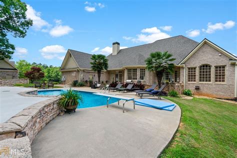 See more ideas about ranch addition, ranch house, house exterior. CUSTOM BRICK RANCH HOME WITH EXQUISITE FINISHES | Georgia ...