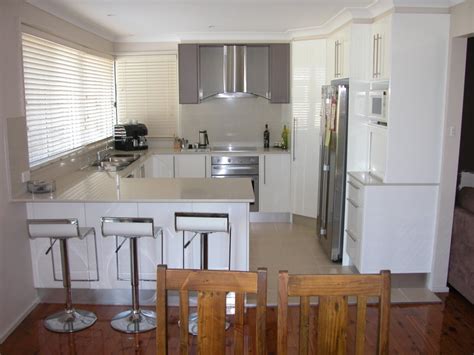 U shaped kitchen layout with island kitchen peninsula u shaped. Classic u-shaped kitchen design using polished concrete ...