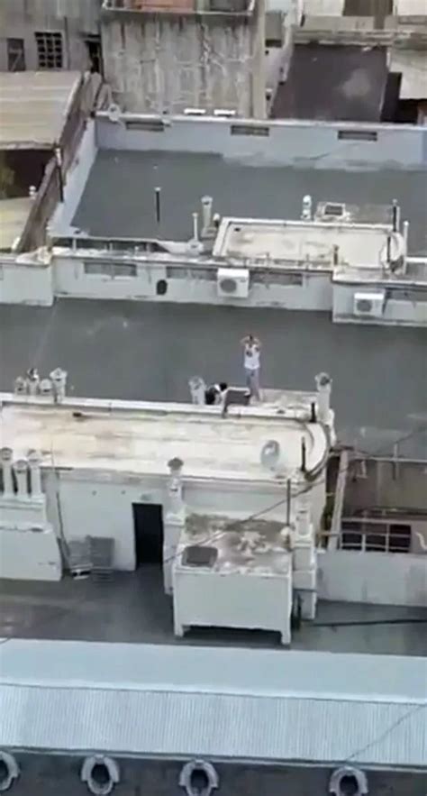 Naked Couple Caught Having Sex On Rooftop Before Man Takes Bow For