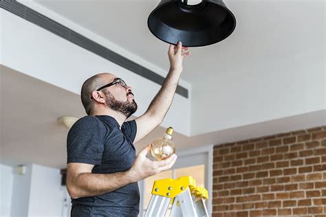 How To Change A Light Bulb In High Ceilings At Your Office Business