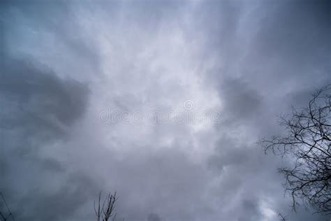 Abstract Background Of Dramatic Sky With Dark Gray Clouds And Rain