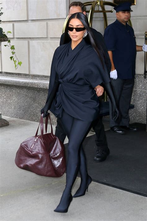 Kim Kardashian Dons All Black Ensemble As She Leaves The Ritz Carlton And Heads To Snl For