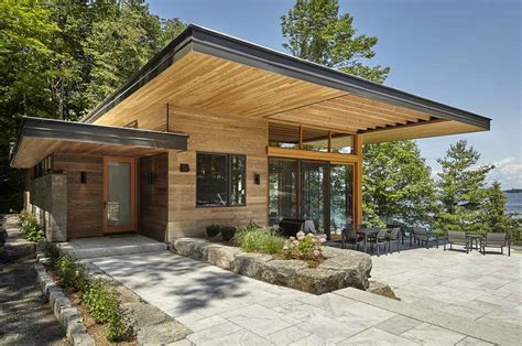 A Stylish Pair Of Modern Cottages Lost Among The Beautiful Canadian