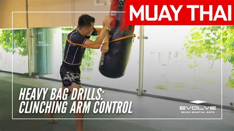 Evolve Universitys Muay Thai Heavy Bag Drills Clinching Arm Control
