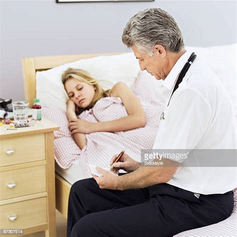 Doctor Bedside Photos And Premium High Res Pictures Getty Images