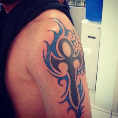 Fire tribal tattoo wearing … 23 Wonderful Tribal Fire and Flame Tattoo | Only Tribal