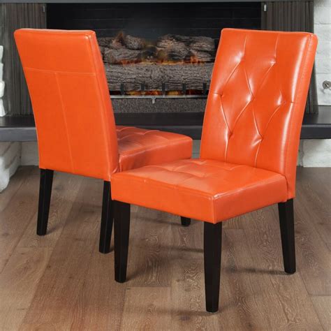 View all chairs with ottomans fabric chairs leather chairs lounge chairs artisan wood chairs swivel chairs. Set of 2 Contemporary Orange Leather Dining Chair w Tufted ...