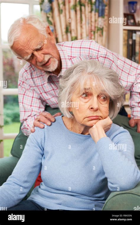 Man Comforting Senior Woman With Depression Stock Photo Alamy