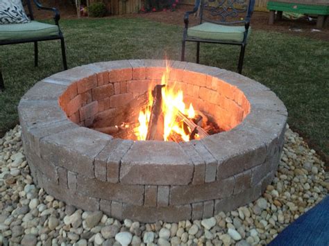 Rumblestone Firepit With River Stone Surround And Red Lava Rock Center