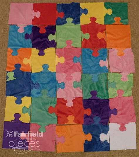 The design can literally be woven with ribbon, or merely printed on the fabric, but the overall effect is symmetrical and somewhat like a checkerboard. Pieces by Polly: Puzzle Quilt with Cuddle Fabric - Free ...