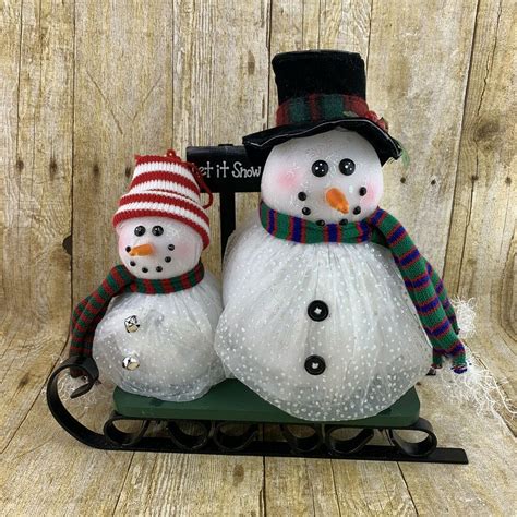 What kind of material is a snowman made of? Snowmen Iron Sled Holiday Display SEE VIDEO Fiber Optic ...