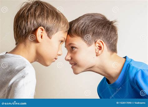 Two Angry Brothers Fighting In Park Outdoors Royalty Free Stock Photo