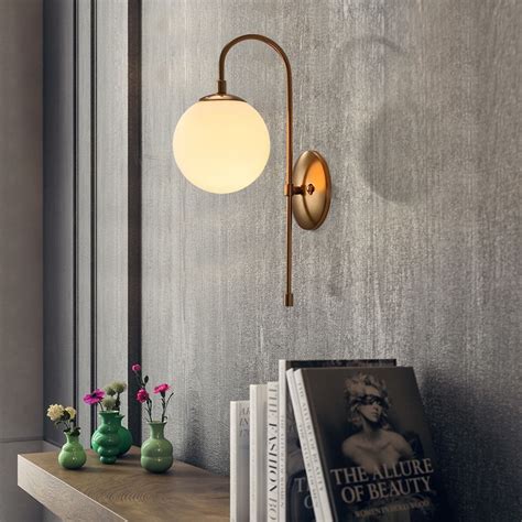 Minimalist Metal Curved Arm Aged Brass Single Light Indoor Sconce With