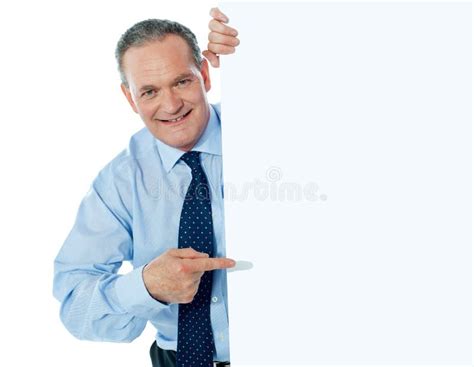 Businessman Peeking Behind A Whiteboard Stock Image Image Of Modern