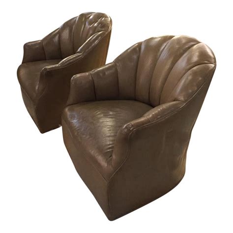 Most reproductions of the midcentury chairs we found can go for thousands of dollars at modern design stores. Mid-Century Leather Swivel Club Chairs - A Pair | Chairish