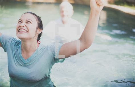 Joyous Woman Giving Praise After Being Baptized — Photo — Lightstock