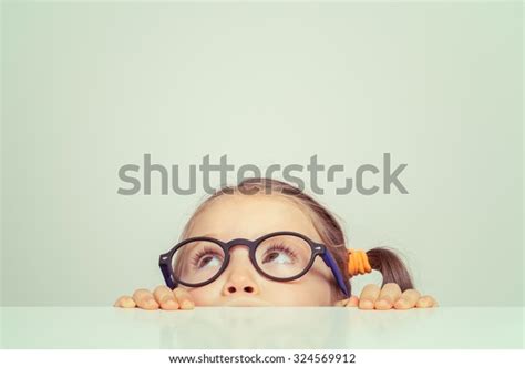 Cute Little Girl Hiding Behind Table Stock Photo Edit Now 324569912