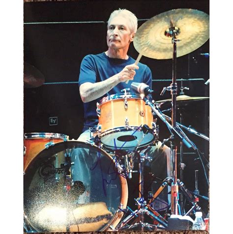 His death, in a hospital, was announced by his publicist. Rolling Stones Charlie Watts large 11x14 signed image at the drums