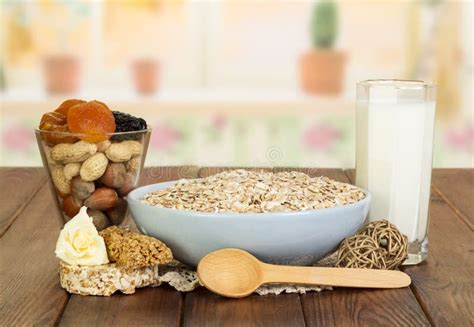 Bowl Oatmeal Milk Dry Fruits And Nuts On Background Kitchen Stock