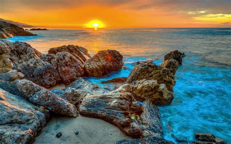 sunset,-rocks,-sea,-beach-background-hd-08523-wallpapers13-com